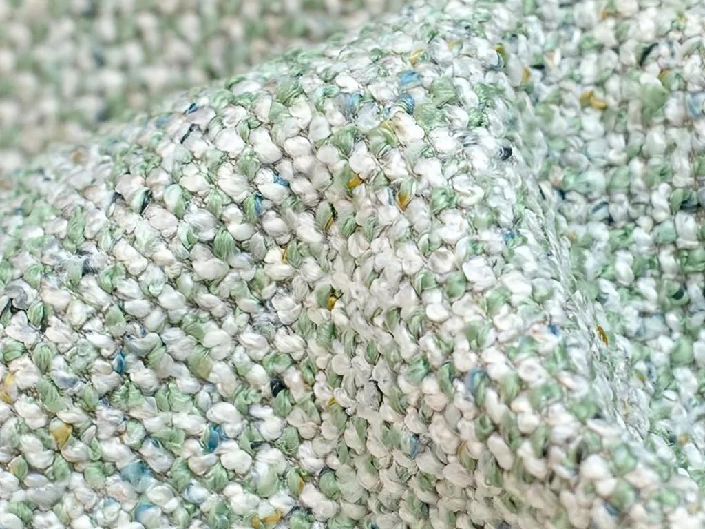 Divano in tessuto verde